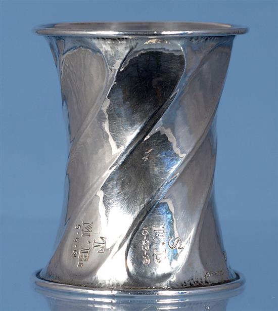 A George V Arts & Crafts planished silver waisted napkin ring, by Omar Ramsden, Height 58mm weight 1.3oz/43grms